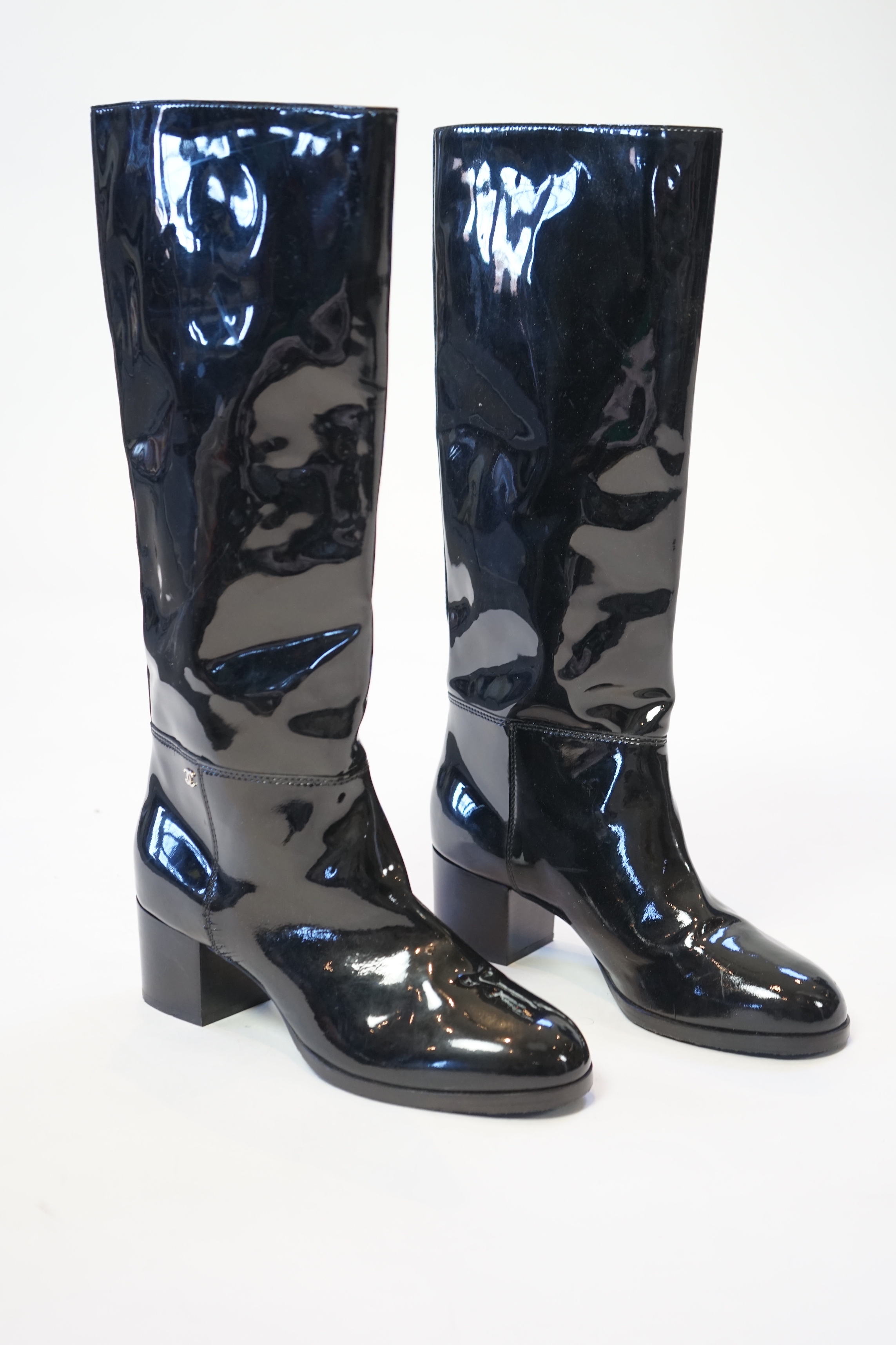 A pair of Chanel lady's black patent knee high mid heel rain boots, size EU 40.5